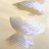 Декоративные перья серебряного Pheasаnt 4-7 см. 10 шт.