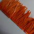 Тесьма из перьев петуха на ленте 25-30 см. Оранжевый цвет