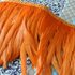 Тесьма из перьев петуха на ленте 30-35 см. Оранжевый цвет